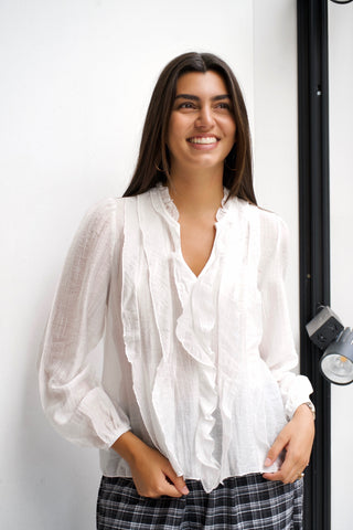 BLUSA BLANCA VOLANTES