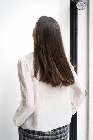 BLUSA BLANCA VOLANTES