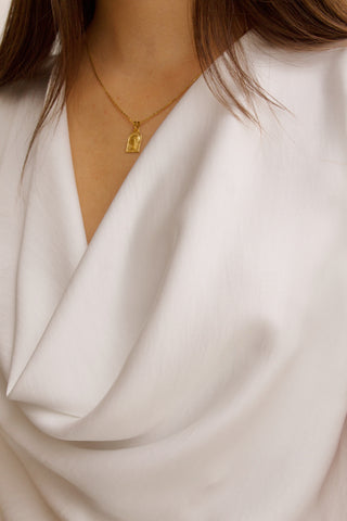 TOP BLANCO ESCOTE DRAPEADO