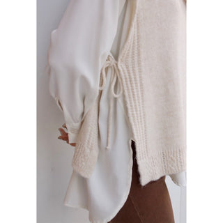 CHALECO DE PUNTO LAZADAS LATERALES