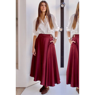 FALDA DE RASO CON BOLSILLOS