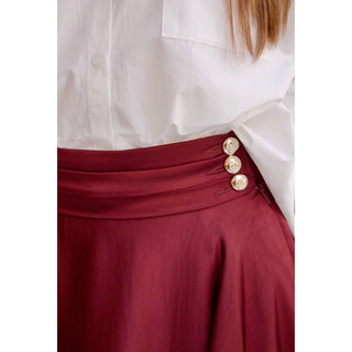 FALDA DE RASO CON BOLSILLOS